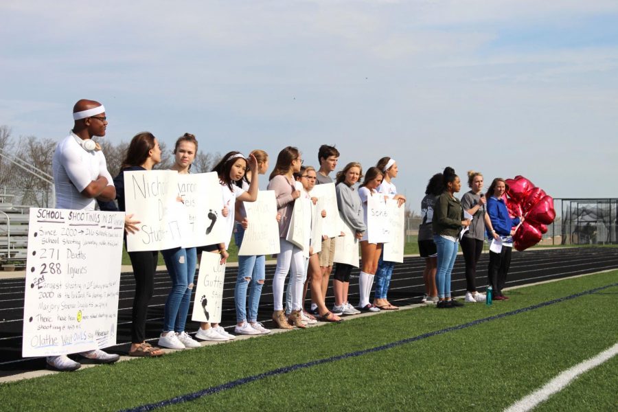 The walkout was focused on honoring the victims of the Marjory Stoneman Douglas school shooting which occured Feb. 14. Students held posters for each victim and later released 17 balloons in remembrance.