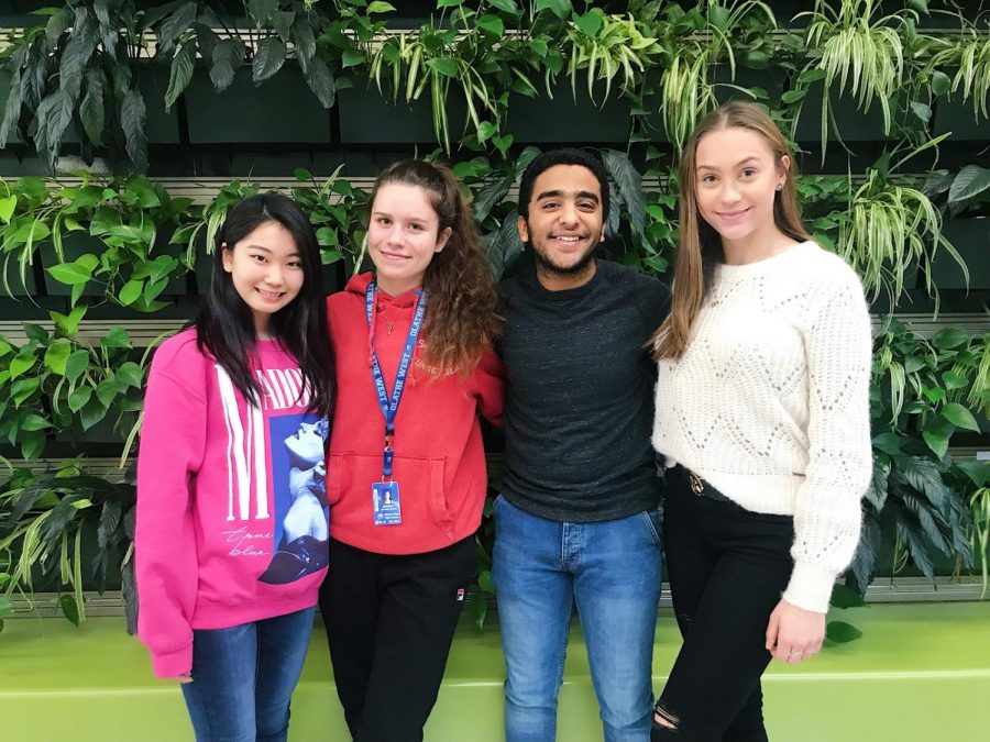 Foreign exchange students from Olathe West stand together for photo. Karen Fukami (Far left) Monica Almagro, Maged Wadi, and Sarah Mari Nielsen (Far right.)
