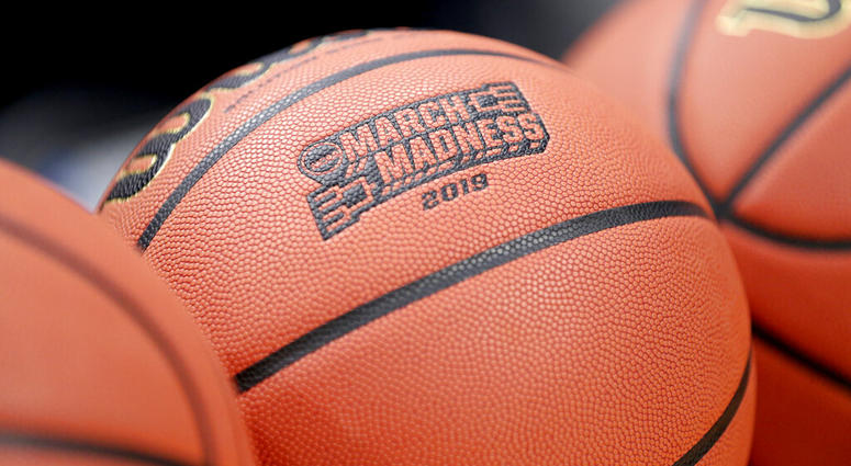 FILE - This Wednesday, March 20, 2019, file photo shows a basketball with March Madness 2019 in a rack before Michigan practice at the NCAA college basketball tournament in Des Moines, Iowa. An Ohio man has made history with a March Madness bracket thats perfect through 48 games on the NCAA.coms Bracket Challenge, according to the NCAA. (AP Photo/Nati Harnik, File)