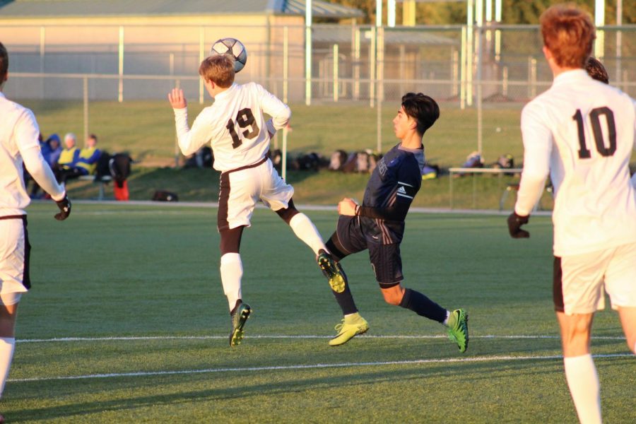 Senior Jony Munoz goes after the ball trying to gain possession.