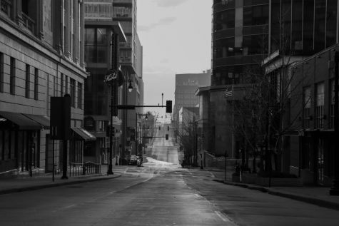 A street in downtown Kansas city goes bare as the stay-at-home order goes full into effect.