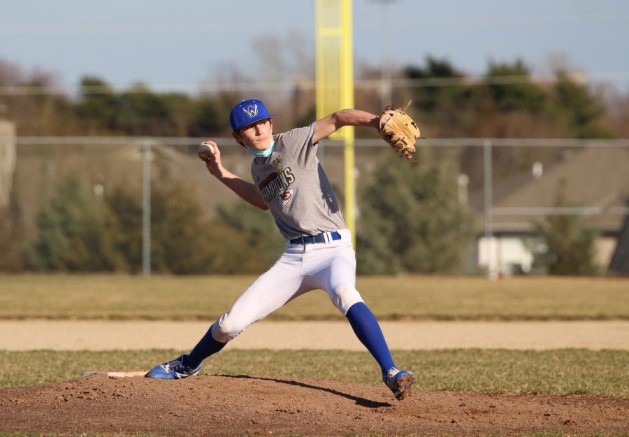 Peter Marshall pitches during the JV and C-team scrimmage.