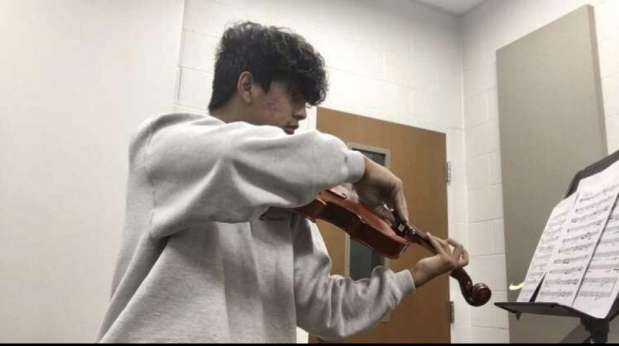 Senior David Morones, finds his passion in theatre and the viola. He takes part in the Hispanic Leadership Club and works to bring Hispanic culture into the arts.