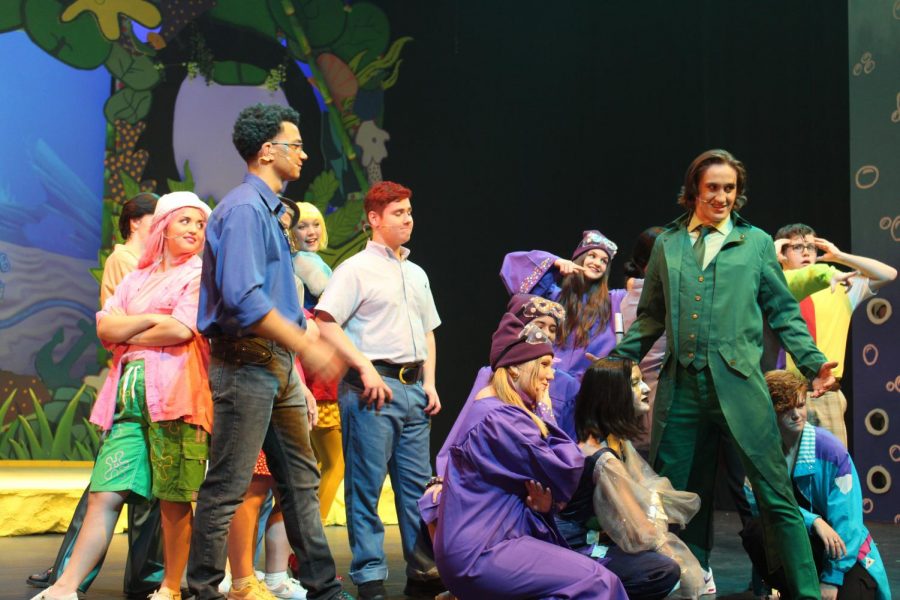 During the “SpongeBob the Musical” rehearsal on Nov. 9, Plankton, played by senior Stone El-Attrache, poses at the end of the “No Control” musical number. The song “No Control” is a song on the soundtrack originally written by David Bowie and Brian Eno.
