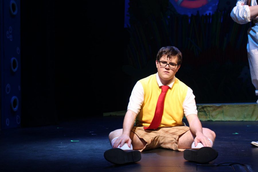 During the “SpongeBob the Musical” rehearsal on Nov. 9, at the end of the first act SpongeBob, played by senior Brandon Heflin, sits on the stage disappointed to see the doom of Bikini Bottom. Heflin has been participating in theater all four years at Olathe West.
