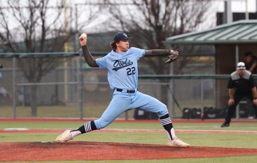 Senior Andrew Evans, pitches in the first inning of the game against Shawnee Mission East. 