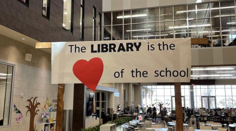 OW Library puts up their monthly sign saying The Library is the heart of the school.