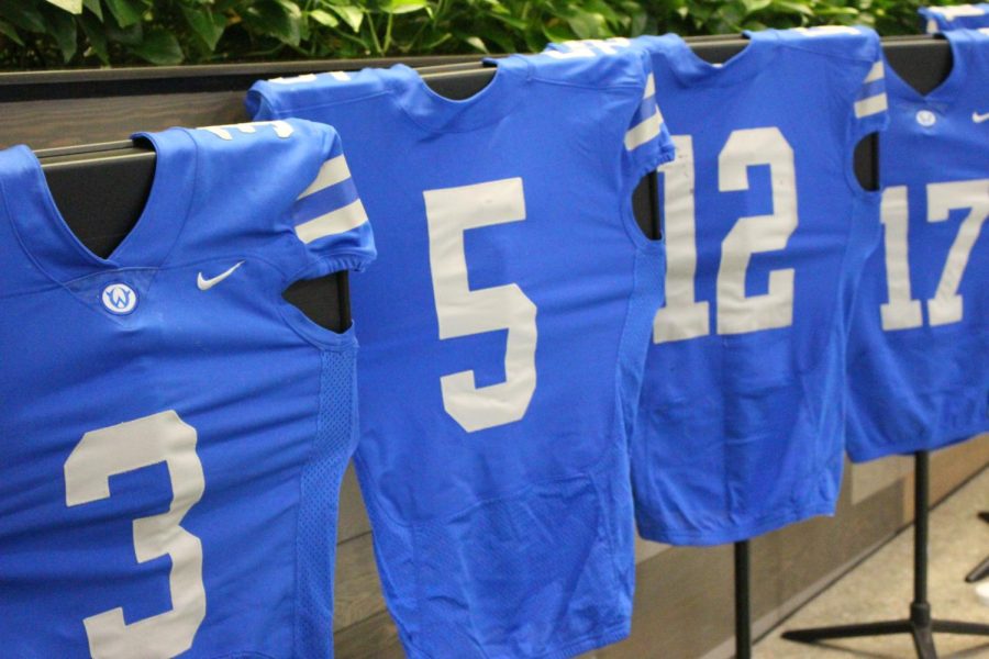 The football teams jerseys were displayed at the football banquet.