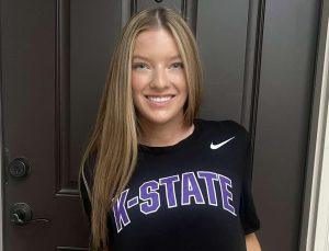 Katelyn Eagan poses with K-State shirt after being accepted into K-State cheer. 