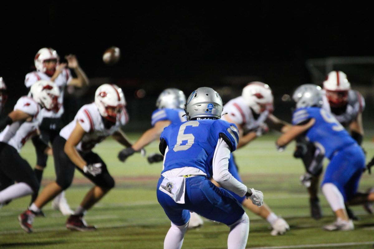 Junior Simba Mundava prepares to block the opposing team as the play begins.