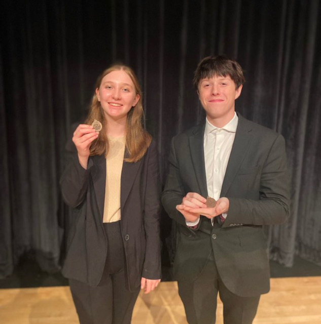 Freshmens Annabelle Owens and Spencer Markus earn 3rd place in the novice division, leaving a 5-0 record. (Photo by Josh Anderson)