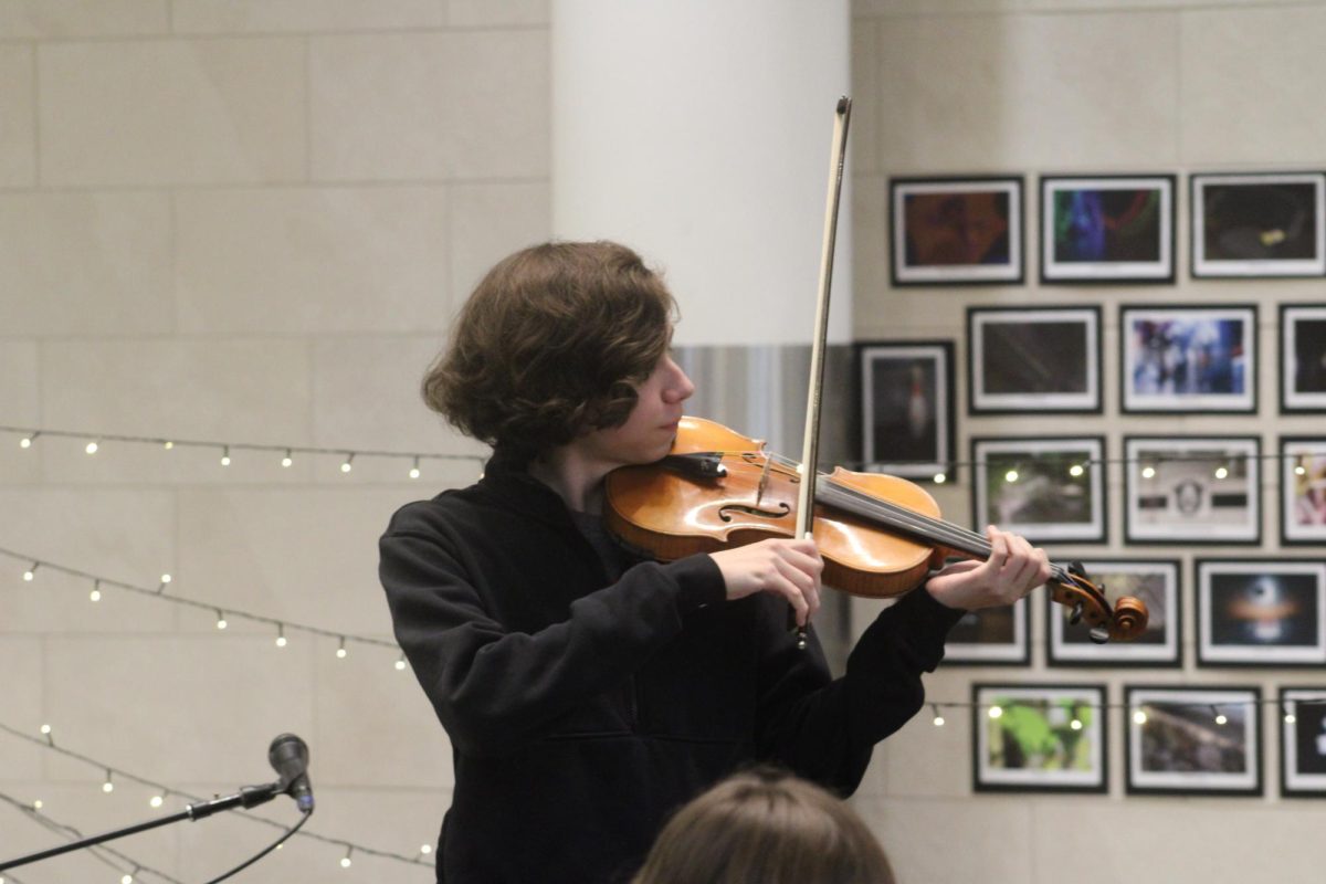 Senior Madden Stueve plays violin.