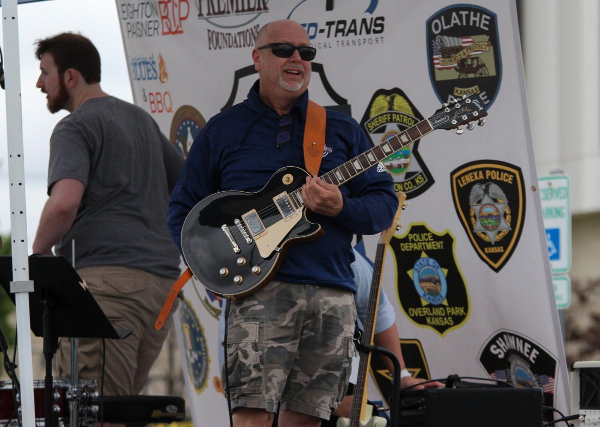 Public Safety instructor Jeff VanDyke warms up before performing with other teachers.