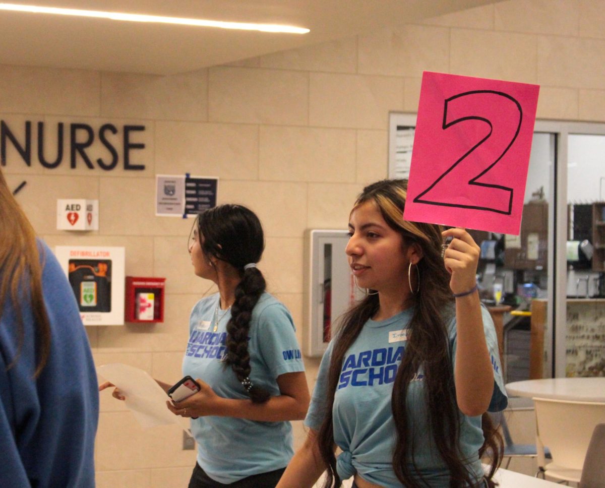 Junior link crew leader, Ivana Beltran leads tours around the school during transition day.