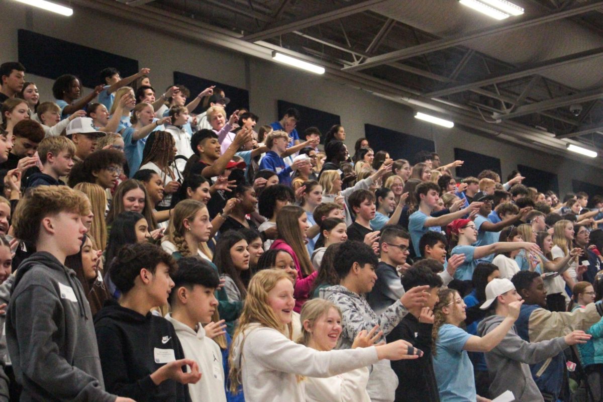 The eighth graders learn OW chants and the fight song during their pep assembly.