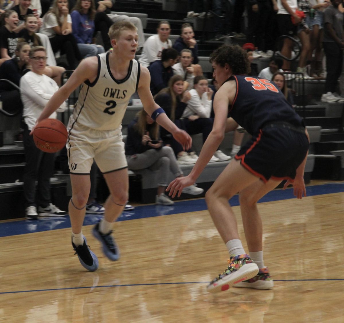 Sophomore Colton Nichols drives to the hoop vs Olathe East