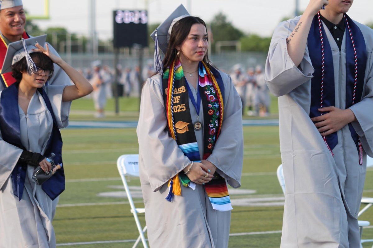 Senior Gabriela Diaz walks to her seat.