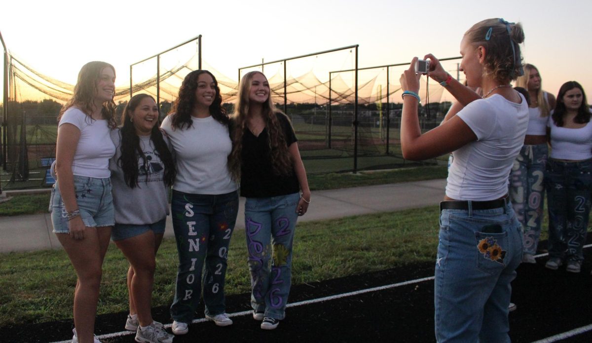 From left, Aubrey Thull, Leslie Duran, Janaya Platas and Hailey Tremain smiling for Julia Kushnirchuk to take photos.