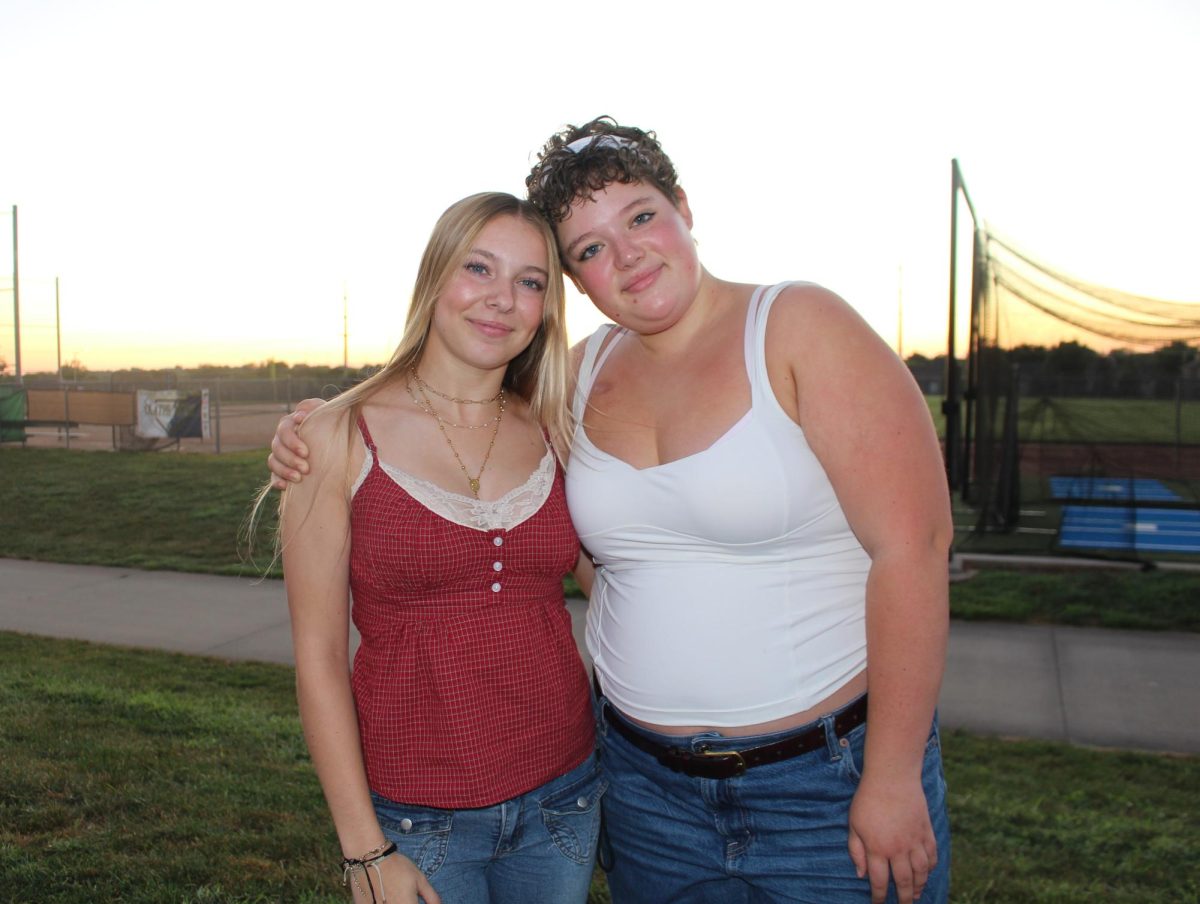 Addy Lago and Violet Vallad smiling for a photo.