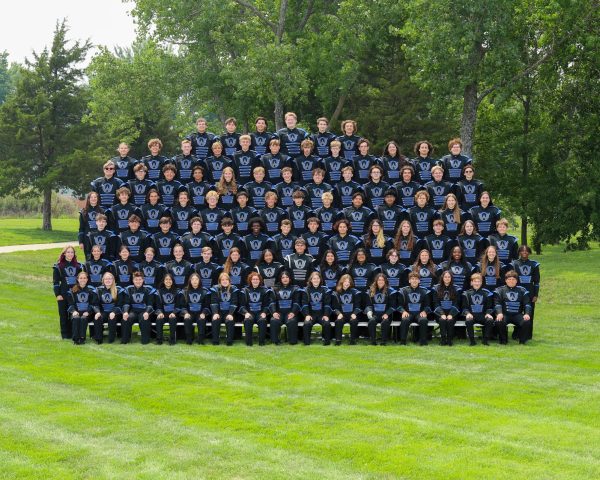 Marching Owls in their uniforms for a group picture.