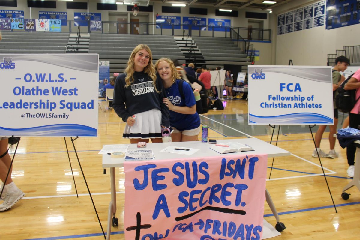 Carlie Ernst and Grace Yeager working the FCA booth.
