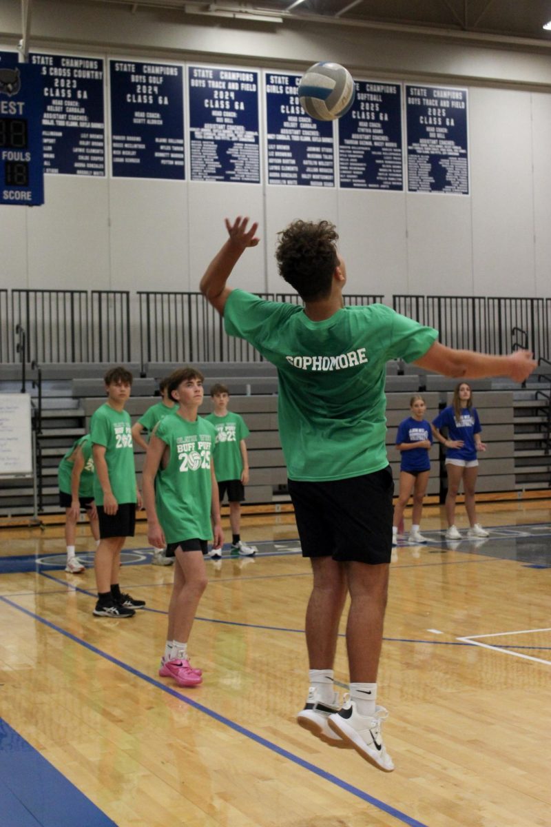 Sophomore team serves the ball.