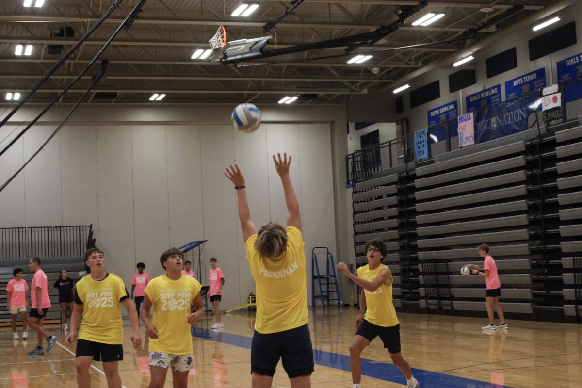 Freshman team going after the ball.