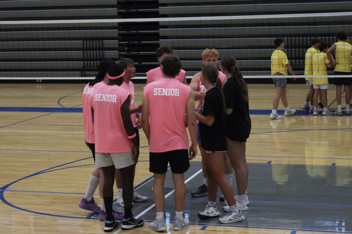 Senior team huddle during a time-out.