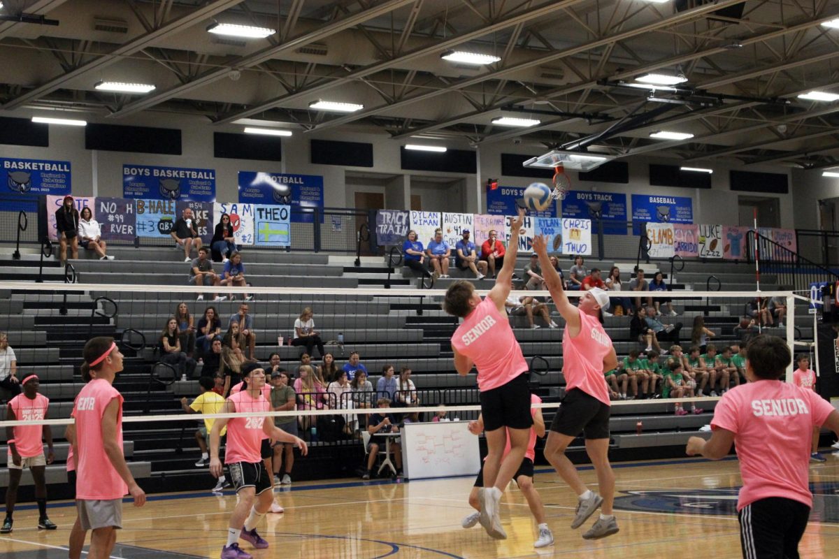 Roy Roseman and Landon blocking a hit from the other senior team.