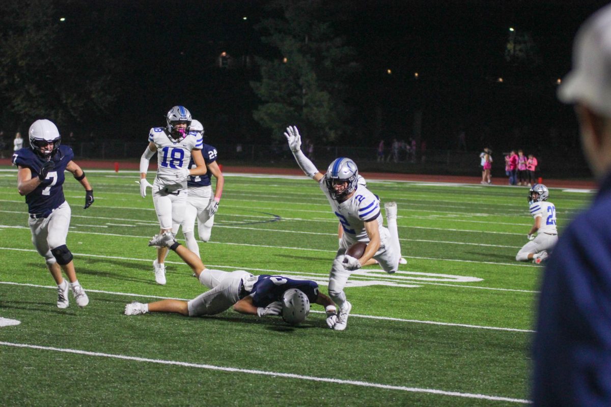 Senior Sam Krzykowski tries to stay up against Mill Valley