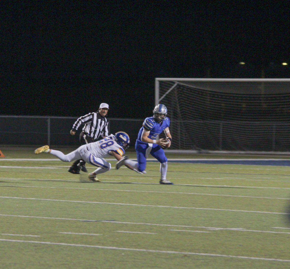 Senior Brody Hale evades a Falcons' defender