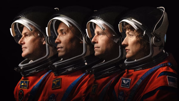 The Artemis II crew lined up from left to right Jeremy Henson, Victor Glover, Reid Wiseman and Christina Koch.